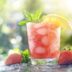 Frozen strawberry lemonade in a glass with garnish